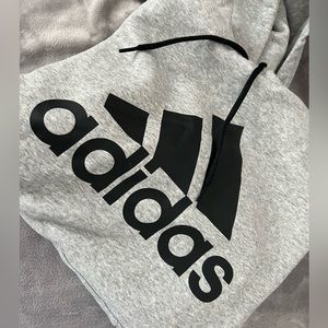cozy adidas hooded sweatshirt with logo on front